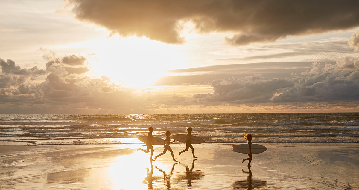 runners on the beach